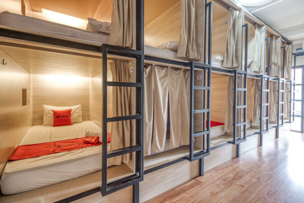 Single bed in mixed dormitory