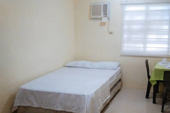 Skyleigh Apartelle by RedDoorz