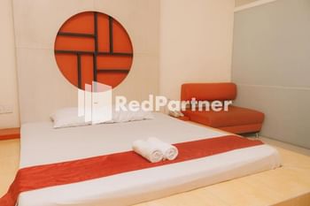 Pits Hotel RedPartner near Atom Mall