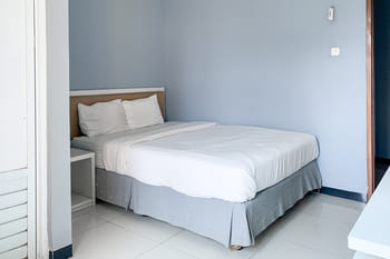 Karins Guesthouse Syariah RedPartner