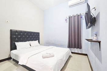 Homestay Sido Joyo near Sunrise Mall Mitra RedDoorz