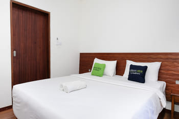 Urbanview Hotel Arta Guna Casa